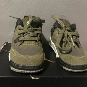 Black and green Jordan’s, size 6c worn once.